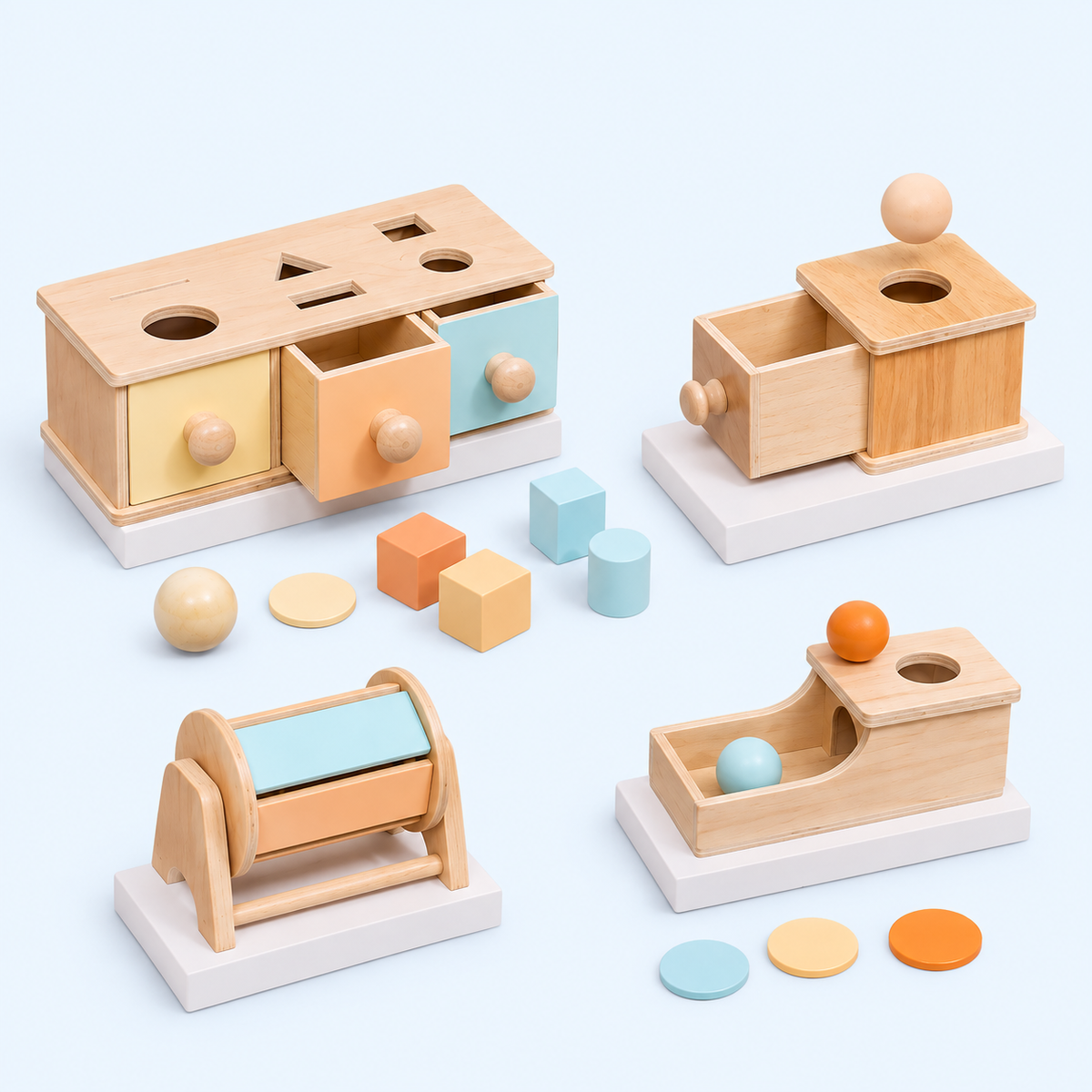 A set of wooden Montessori-style sorting and shape-and-color activity toys arranged on a pale blue background. The set includes a sorting box with shape cutouts and pastel-colored drawers, a rolling tray, a marble run, small blocks, cylinders, and loose round discs in light wood, peach, pale blue, and pastel yellow.